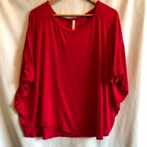 Red “batwing” shirt